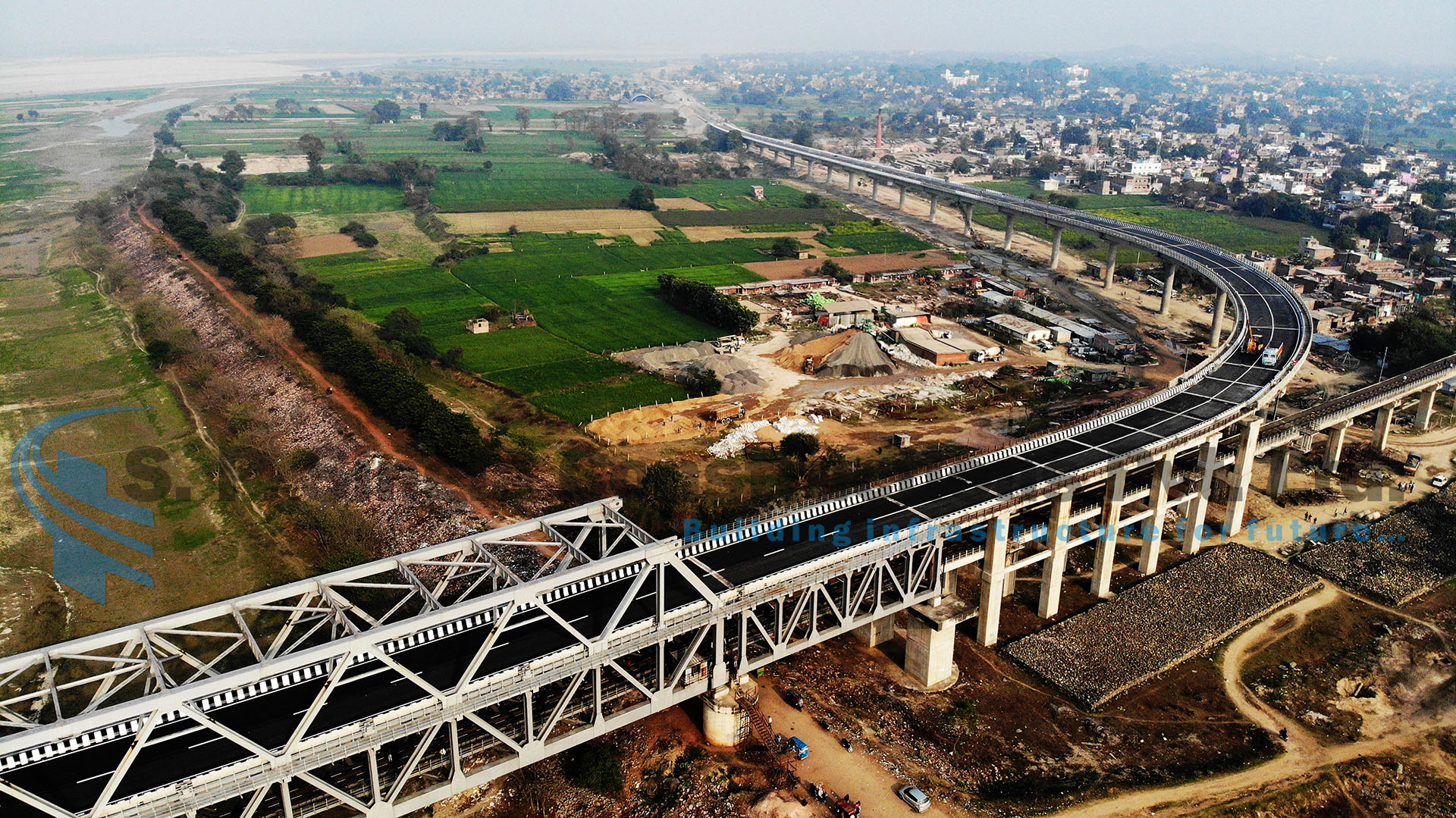 Construction of road approaches to rail cum road bridge across river Ganga at Munger Ghat Near Munger, Bihar