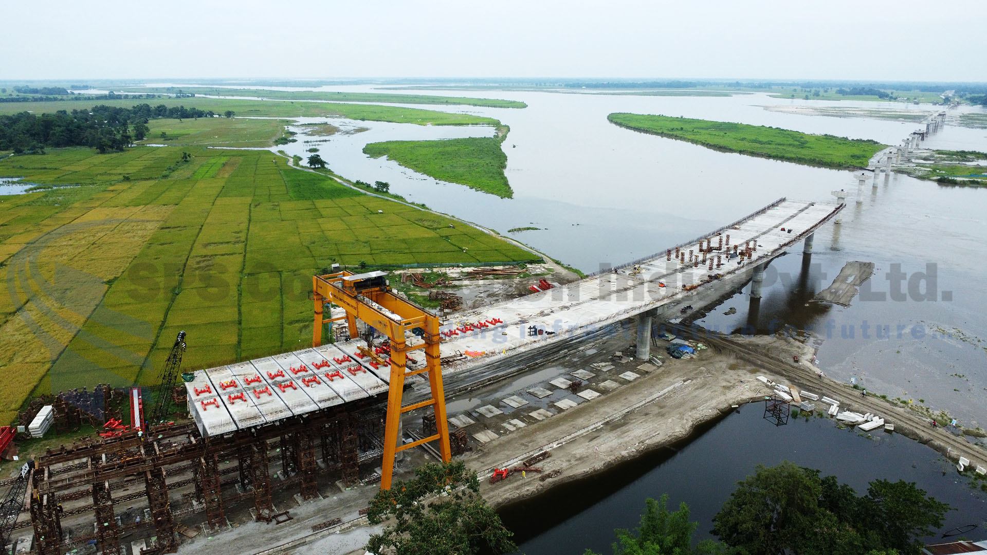 Improvement and upgradation of road from Malichapori, Majuli to Bongalmara, Lakhimpur & construction of two major bridges over river Luit and Subansiri