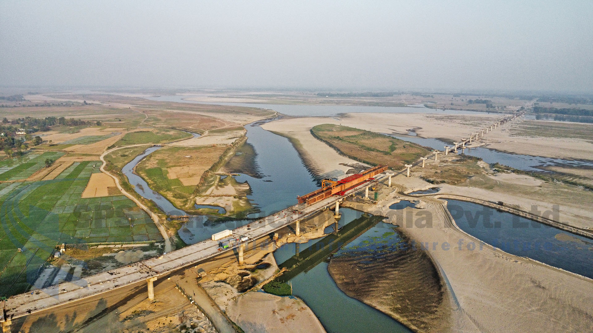 Improvement and upgradation of road from Malichapori, Majuli to Bongalmara, Lakhimpur & construction of two major bridges over river Luit and Subansiri